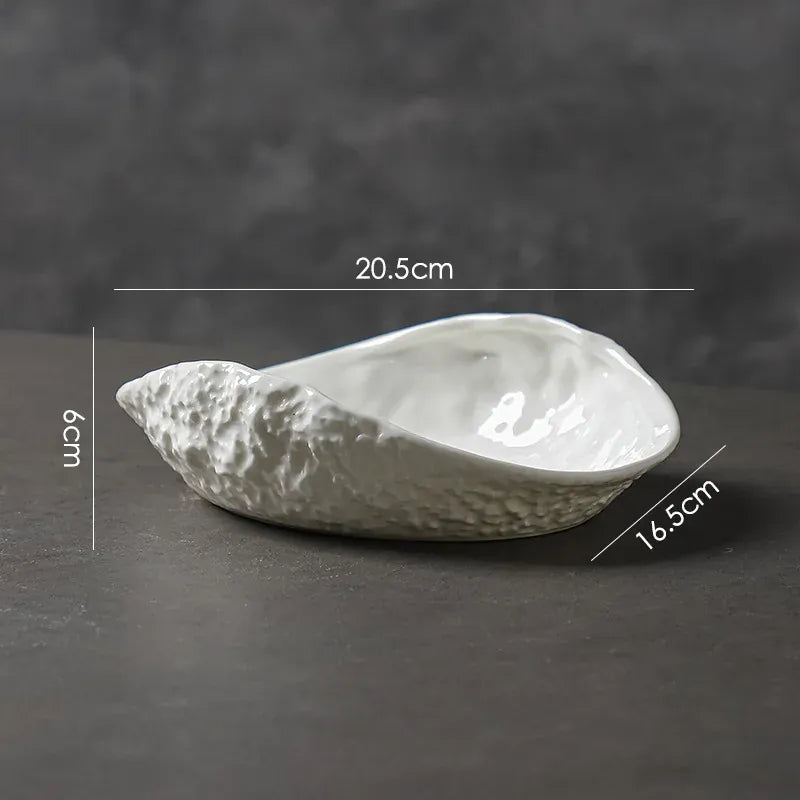 Vase en céramique doré forme coquillage sculpté